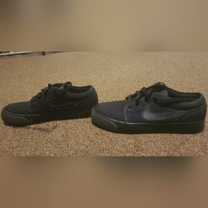 Black Nike canvas shoes